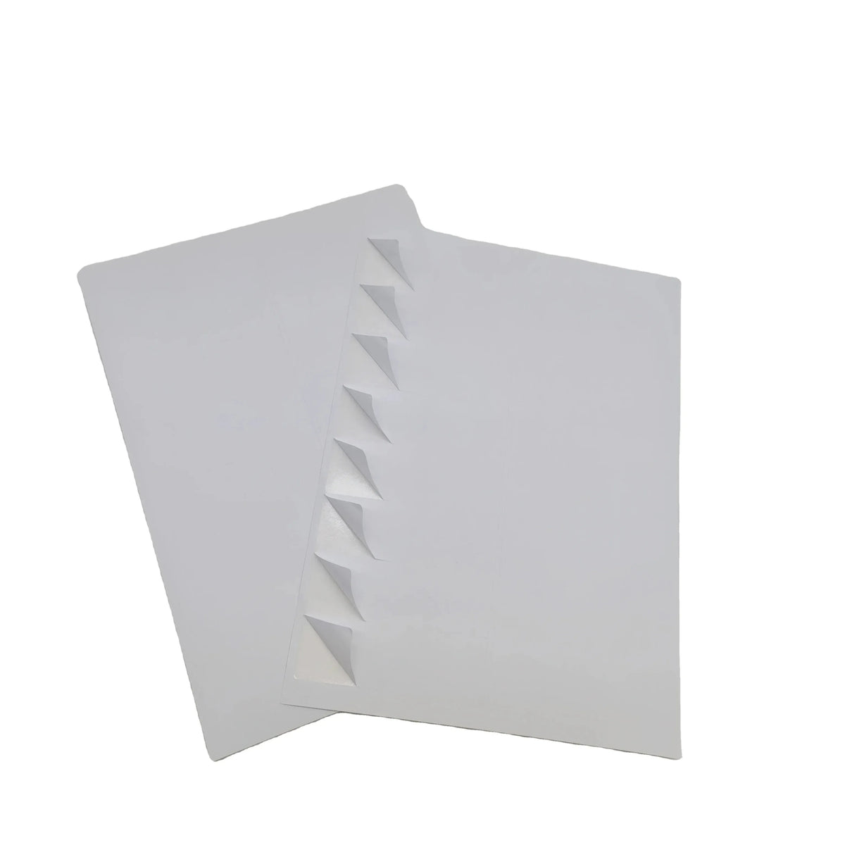 White A4 printable vinyl sticker sheets, two-sheet stack with visible edges