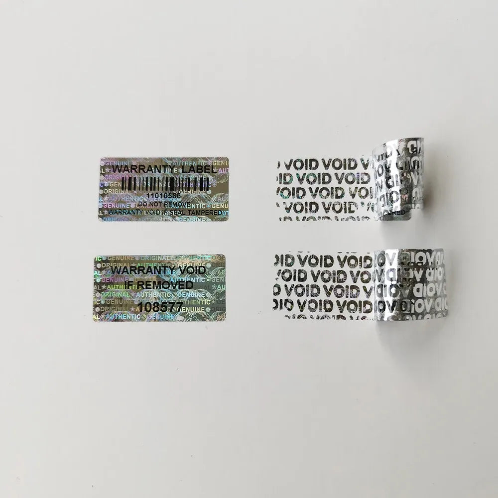 Small holographic warranty void label stickers showing 'VOID' text pattern