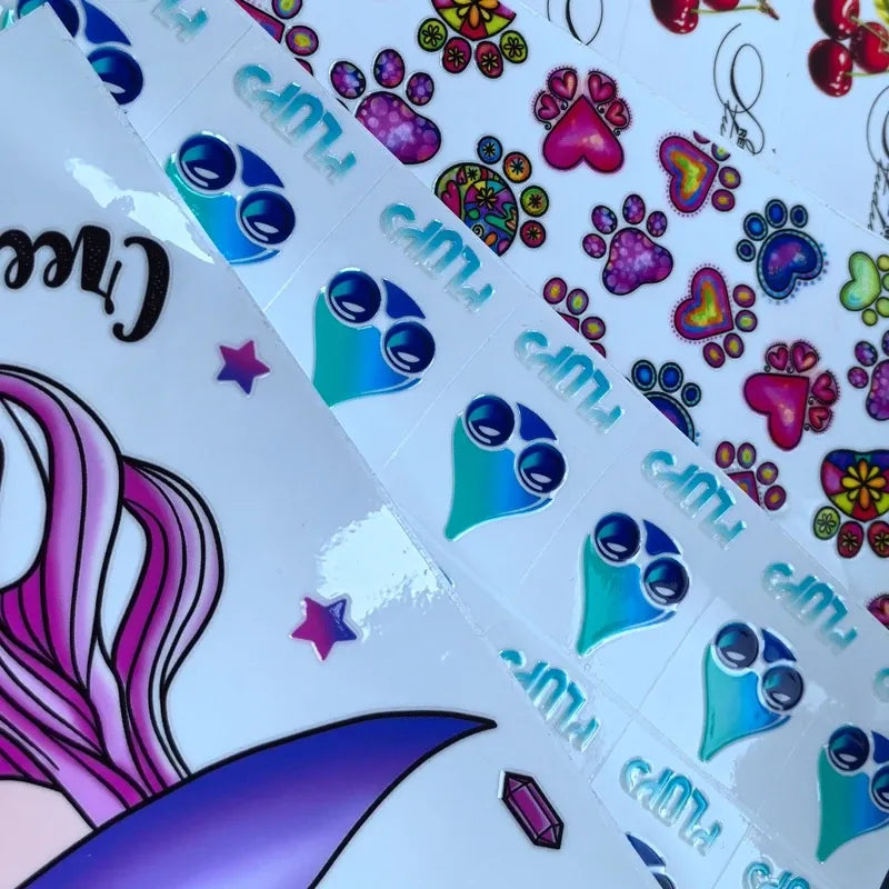 Colorful waterproof die-cut vinyl sticker set with paw prints, hearts, stars, and outlines