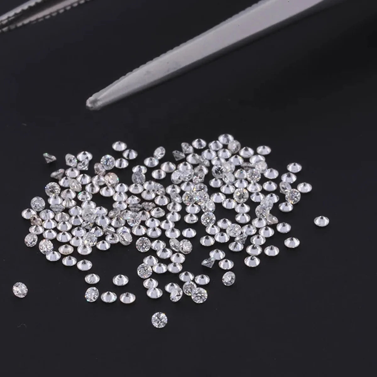 Loose round brilliant lab-grown diamonds, small round stones spread out