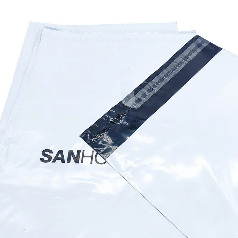White shipping mailer bag with diagonal navy strip and SANHOUSE logo