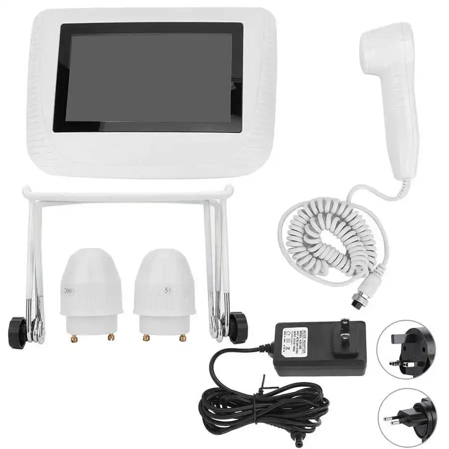 White portable skin and hair follicle analyzer with 50x/200x magnification lenses, display monitor, and power adapter.