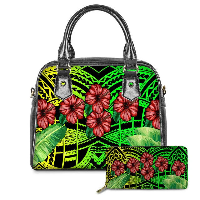 Polynesian tribal print leather handbag and wallet set in black, lime green, and yellow with red hibiscus flower motifs.