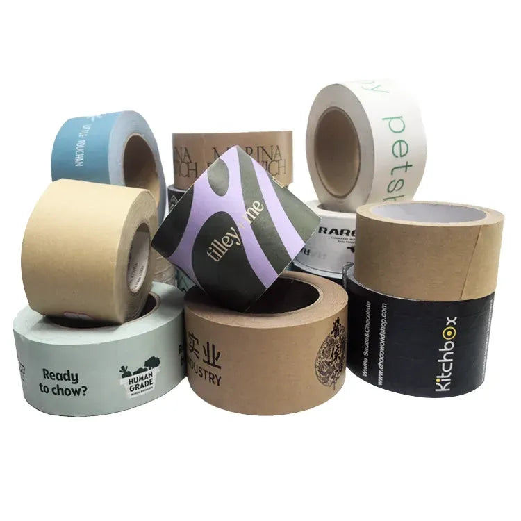 Assorted logo kraft paper tape rolls in multiple colors, stacked together