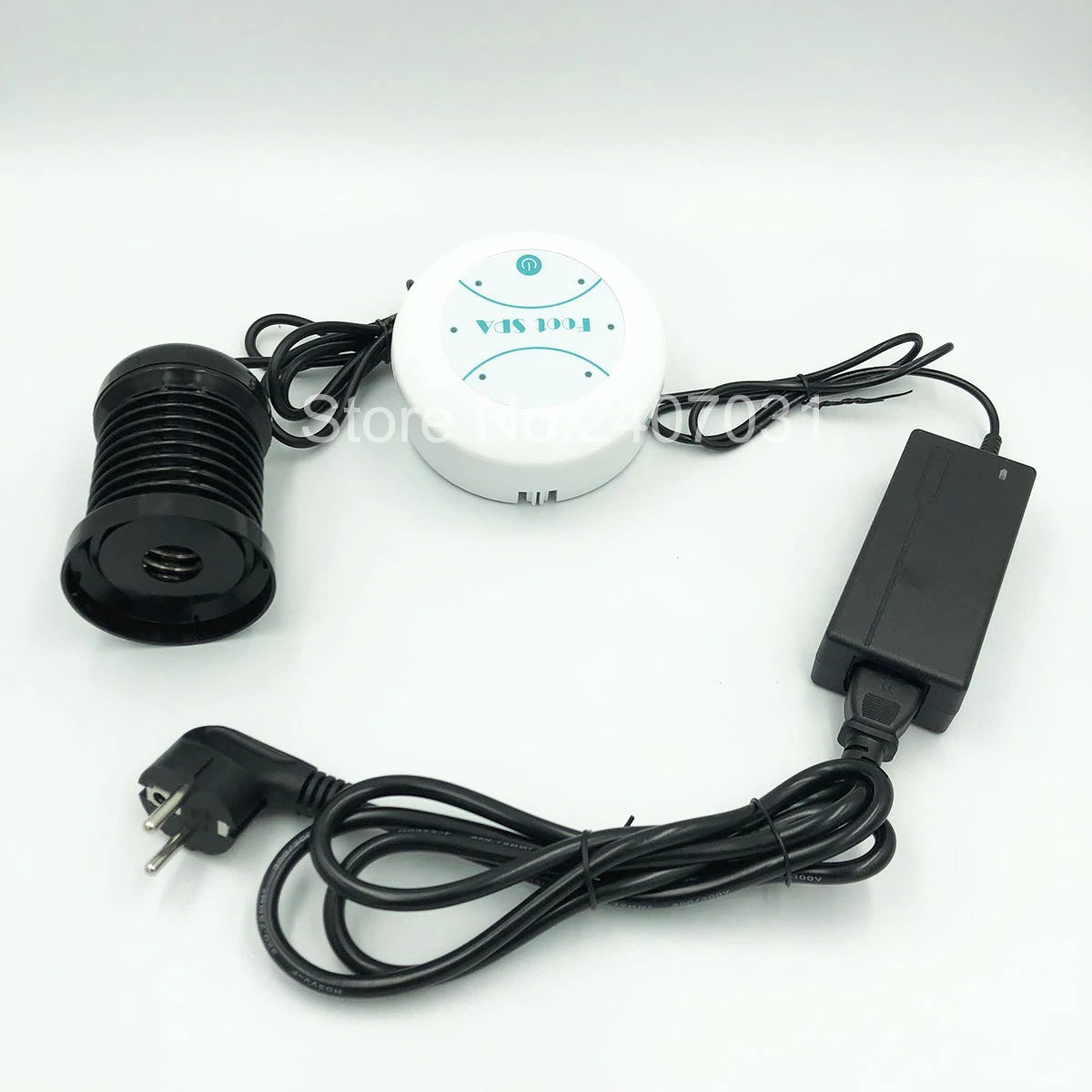 Electric ion detox foot spa machine set with controller, black ion array, and power adapter on white background.