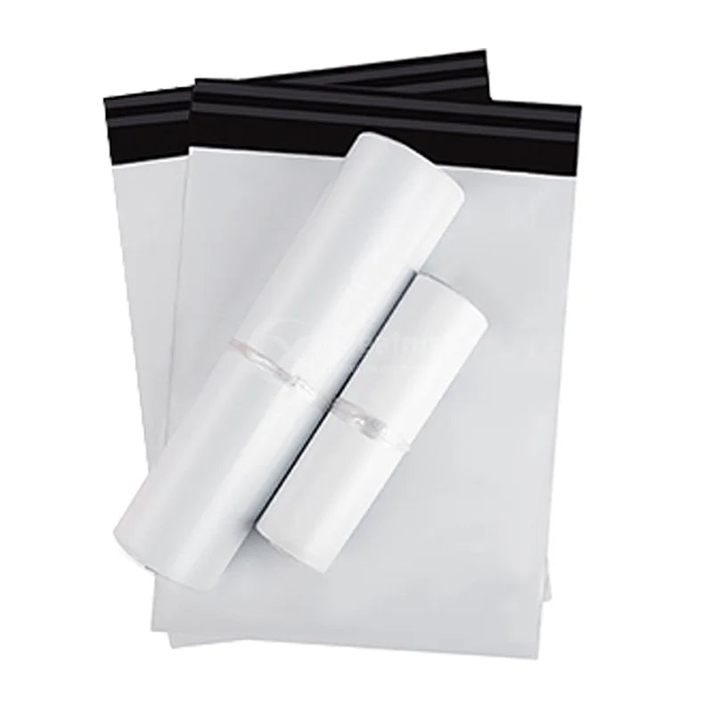 White poly mailer bags with top black strip and top handle cutouts; stacked set