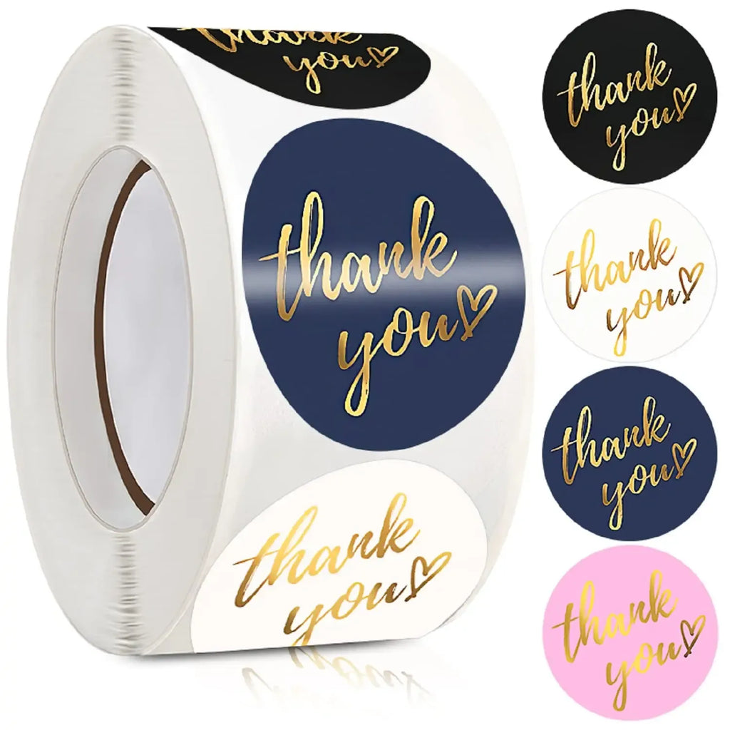 Roll of round adhesive stickers with “thank you” text in dark blue and pink tones
