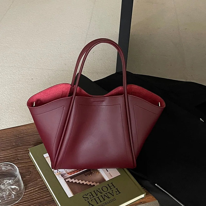 2025 Autumn Winter High-End Niche Genuine Leather Wing Bag Large Capacity Commuter Shoulder Promotional Drawstring Sportpacks