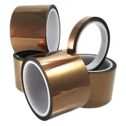 PI tape rolls, multiple brown reflective rolls with black edges on white cores