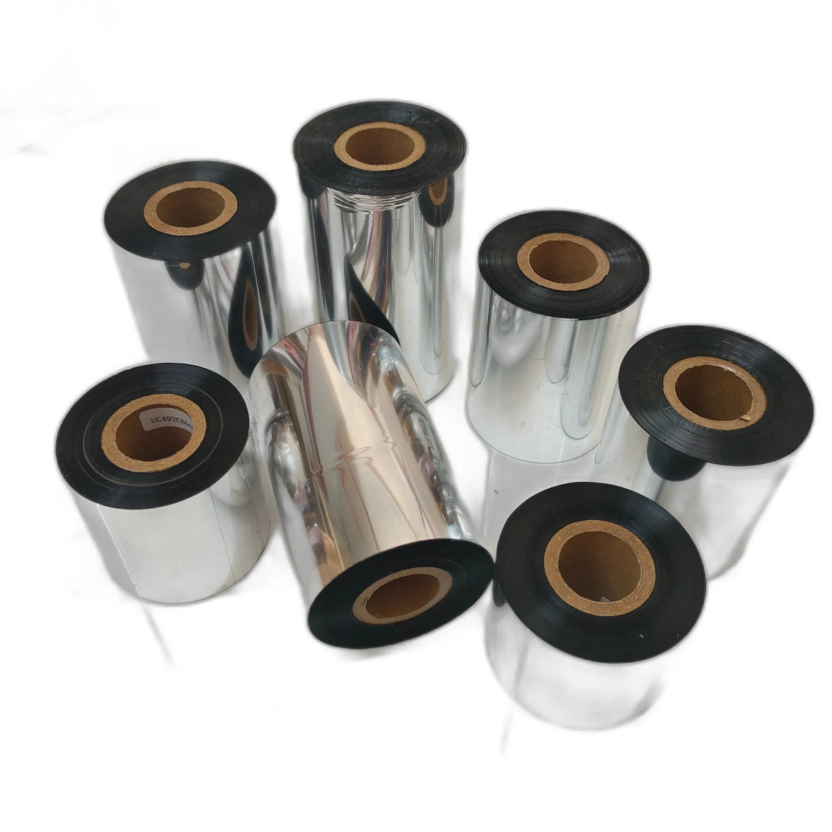 Thermal transfer ribbon rolls bundle with silver foil, black edges, brown inner cores