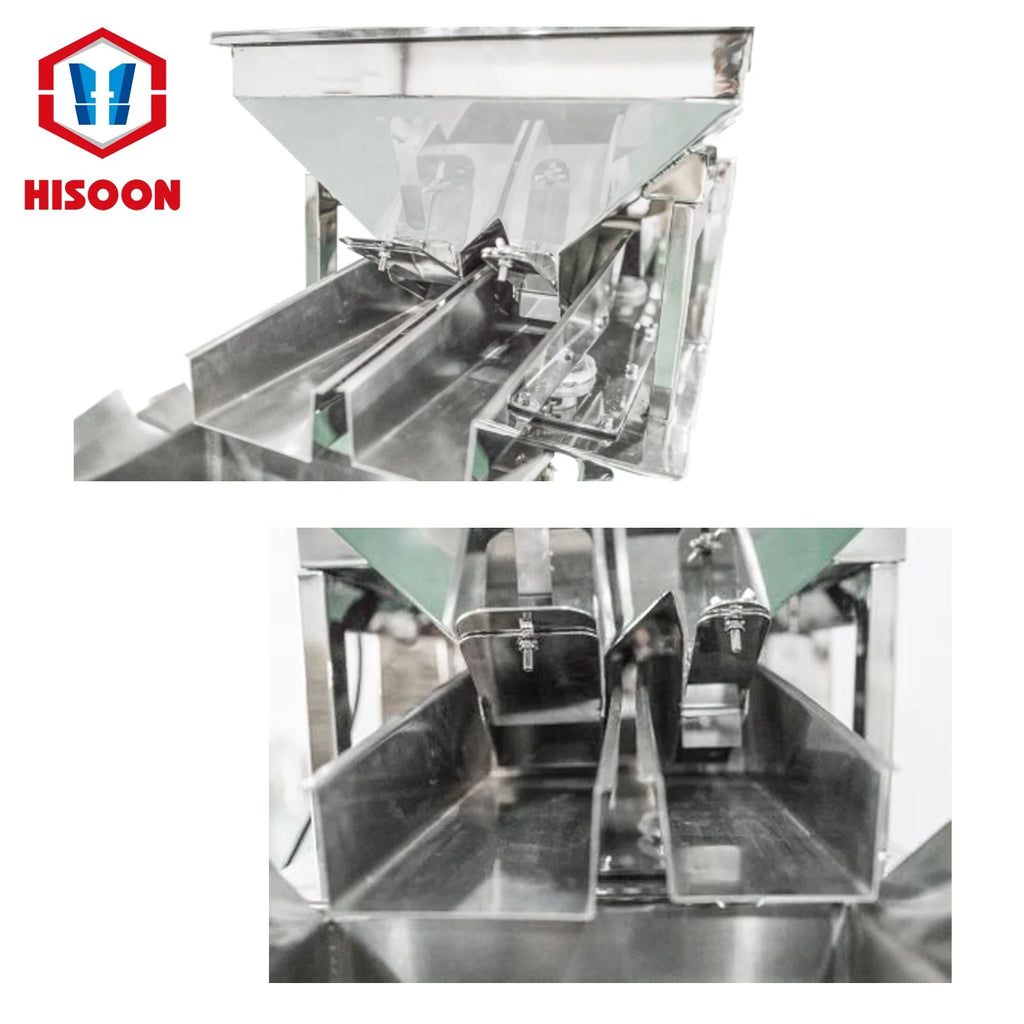 Stainless steel weighing chamber detail with guide chutes and partitions