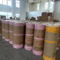 Heat-resistant masking tape jumbo roll on cardboard core, yellow outer wrap