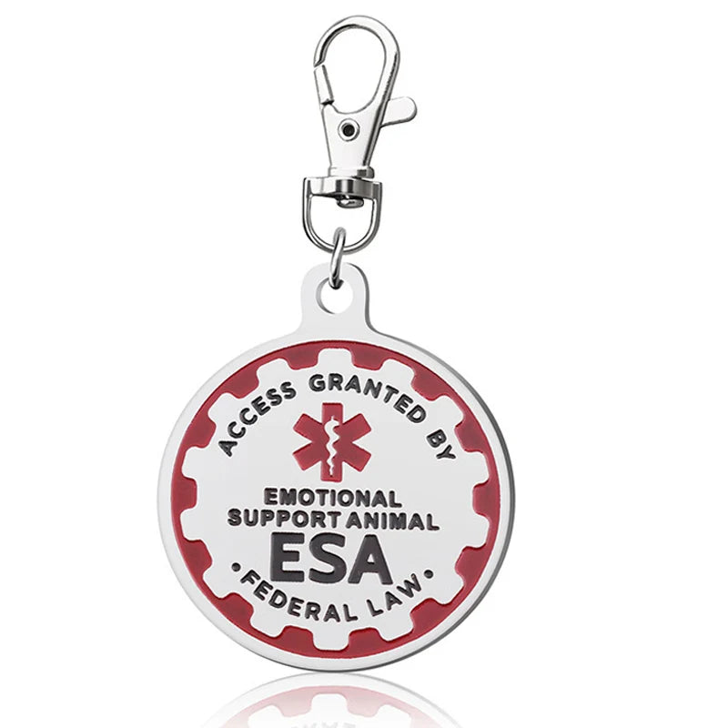 Red and silver metal Emotional Support Animal (ESA) ID tag with clip for easy attachment to dog collars or harnesses.