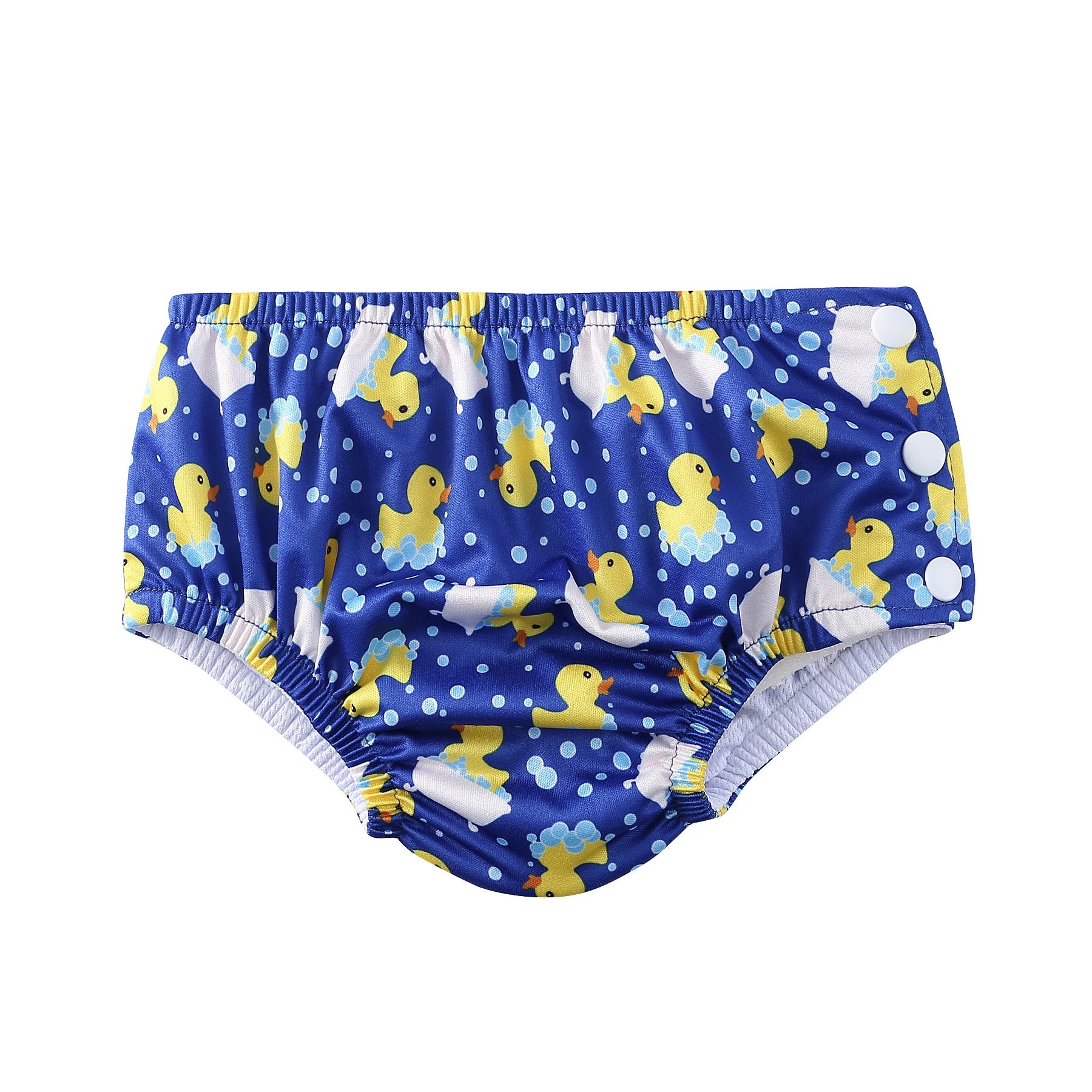 Reusable baby swim diaper in blue with yellow rubber duck pattern and side snap closures.