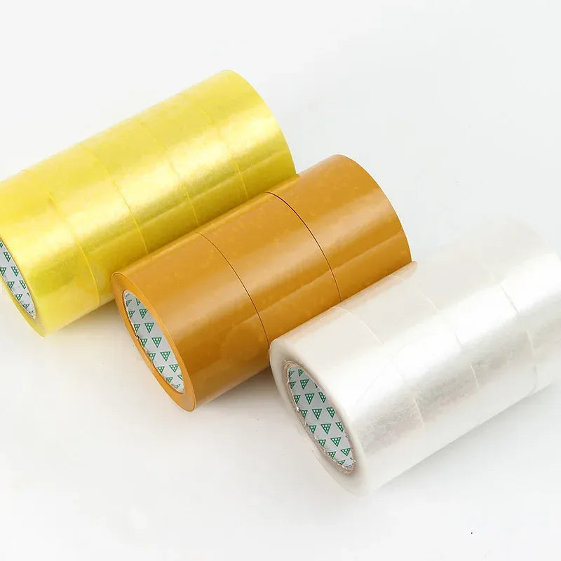 Yellow and amber packing tape rolls with green logo-pattern cores and outer film