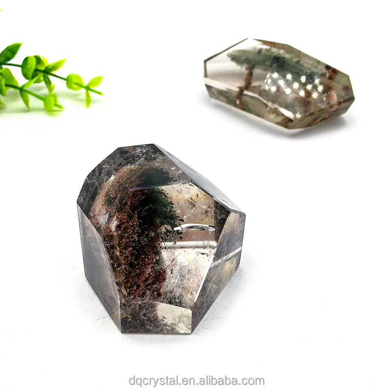 Dark smoky quartz crystal freeform, octagonal faceting, reddish-brown mineral specks
