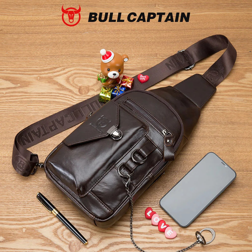 BULLCAPTAIN dark brown genuine leather crossbody sling bag for men with metal chain, zipper pocket, and branded strap.
