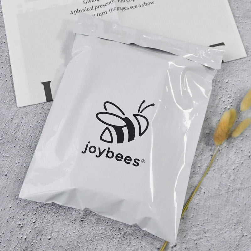 White poly mailer shipping bag with joybees logo print and sealed front