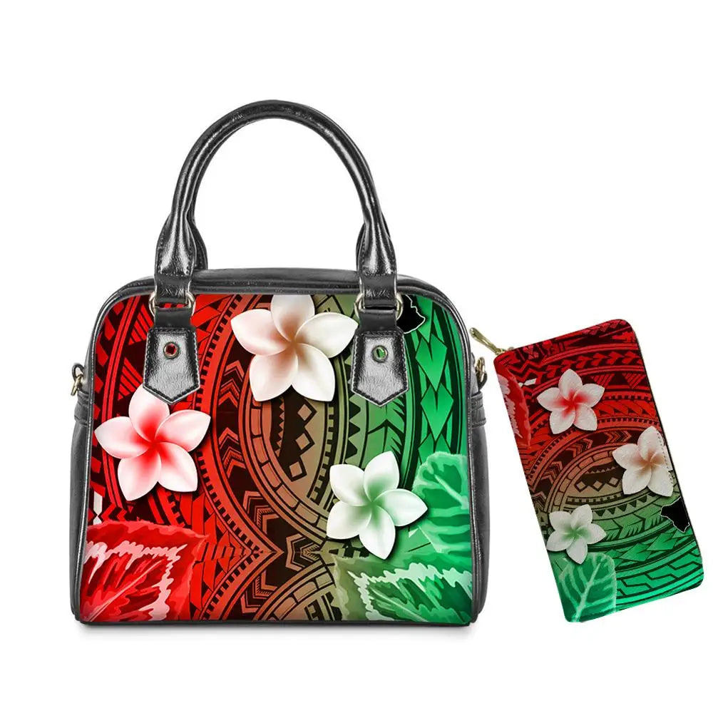 Polynesian tribal print leather handbag and wallet set with colorful plumeria flowers in red and green.