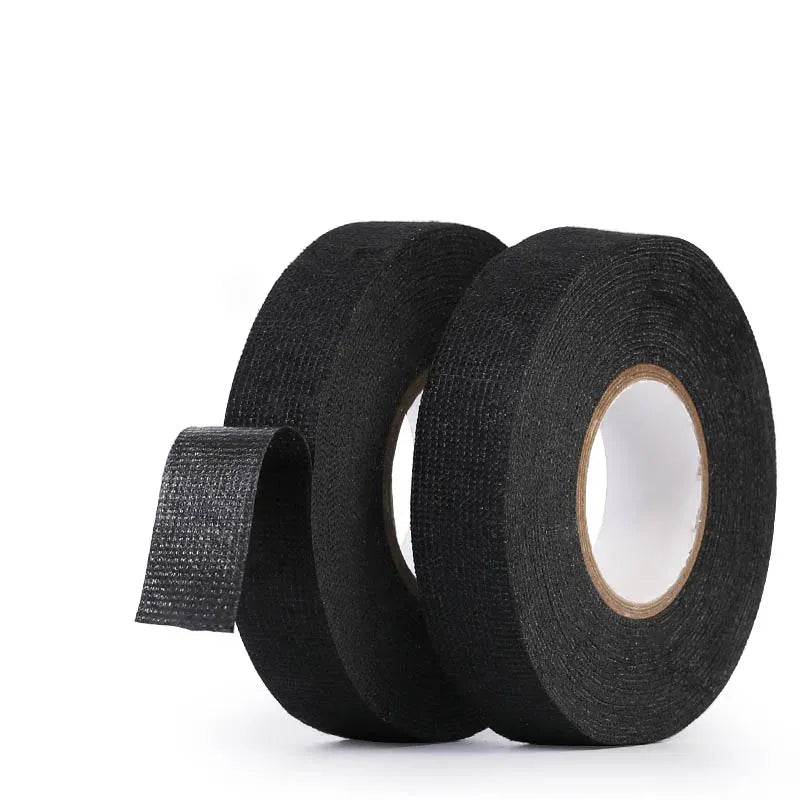 Two rolls of black woven fabric insulation tape with tape ends and cores visible