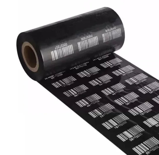 Black thermal transfer ribbon roll with barcode labels printed across the strip