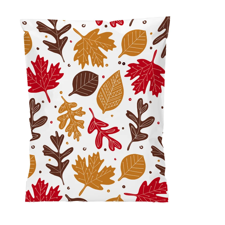 White poly mailer with autumn leaf print, sealed self-adhesive flap