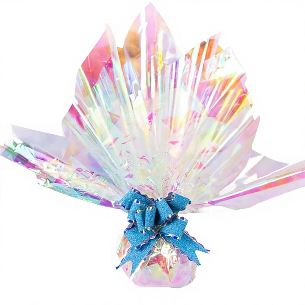 Iridescent holographic flower wrapping paper with folded bouquet wrap and blue ribbon bow