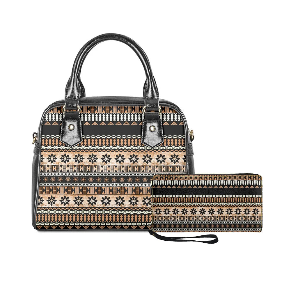 2-piece handbag and wallet set with black and tan Polynesian tribal print, gold-tone accents, and leather-like finish.