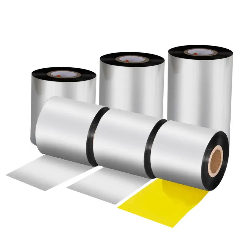 Hot stamping foil rolls in silver with dark cores, plus a small yellow foil strip