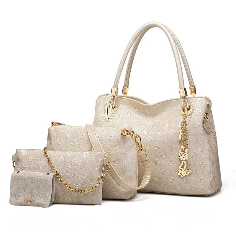 Beige 4-piece faux leather handbag set with patterned texture, gold butterfly charms, and top handles.