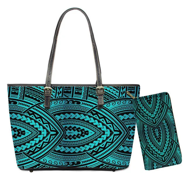 2pcs faux leather handbag and wallet set with black and cyan Polynesian tribal print and classic trunk style.