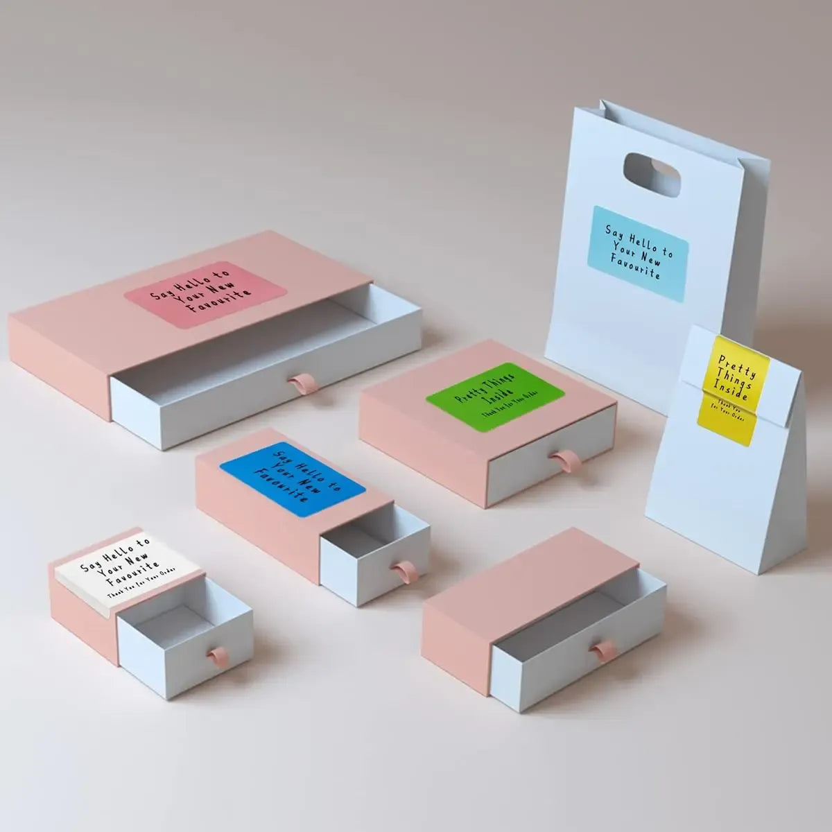 Direct thermal label stickers on small boxes, assorted label colors