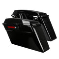 Glossy black hard saddlebag trunks for Harley Touring 1994-2013 with chrome latches and red reflector accents.