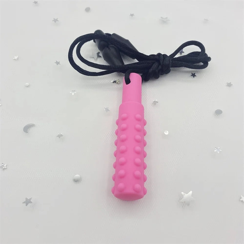 Pink silicone teething toy on a necklace for baby teething relief.