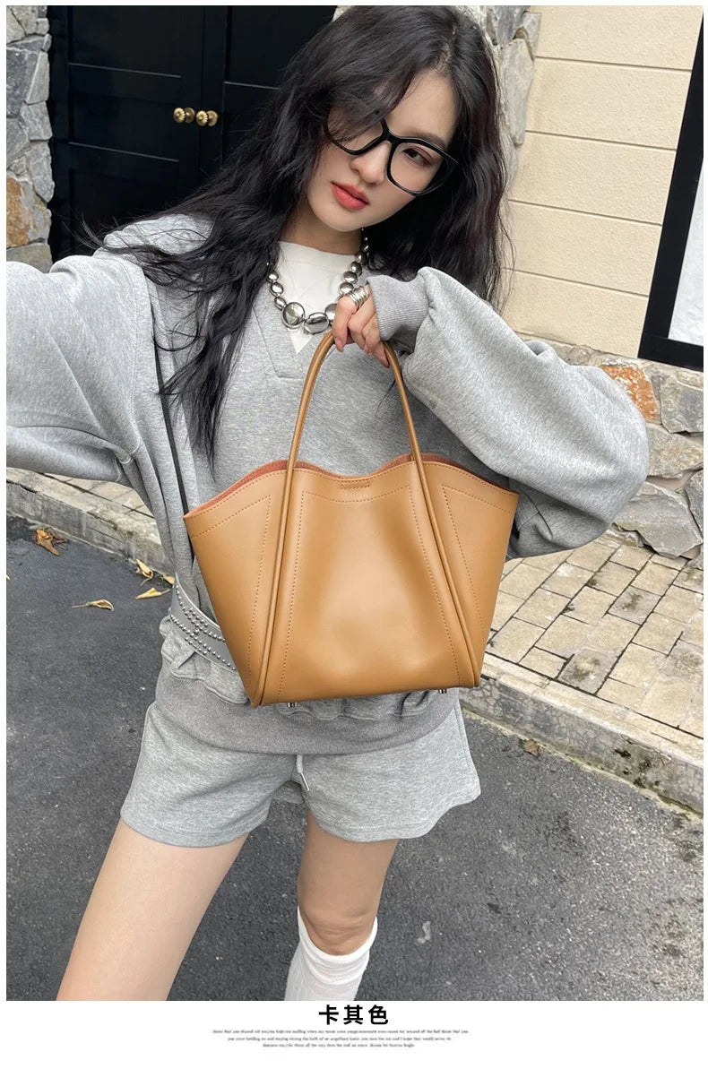 2025 Autumn Winter High-End Niche Genuine Leather Wing Bag Large Capacity Commuter Shoulder Promotional Drawstring Sportpacks