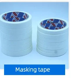 Blue masking tape rolls with patterned labels