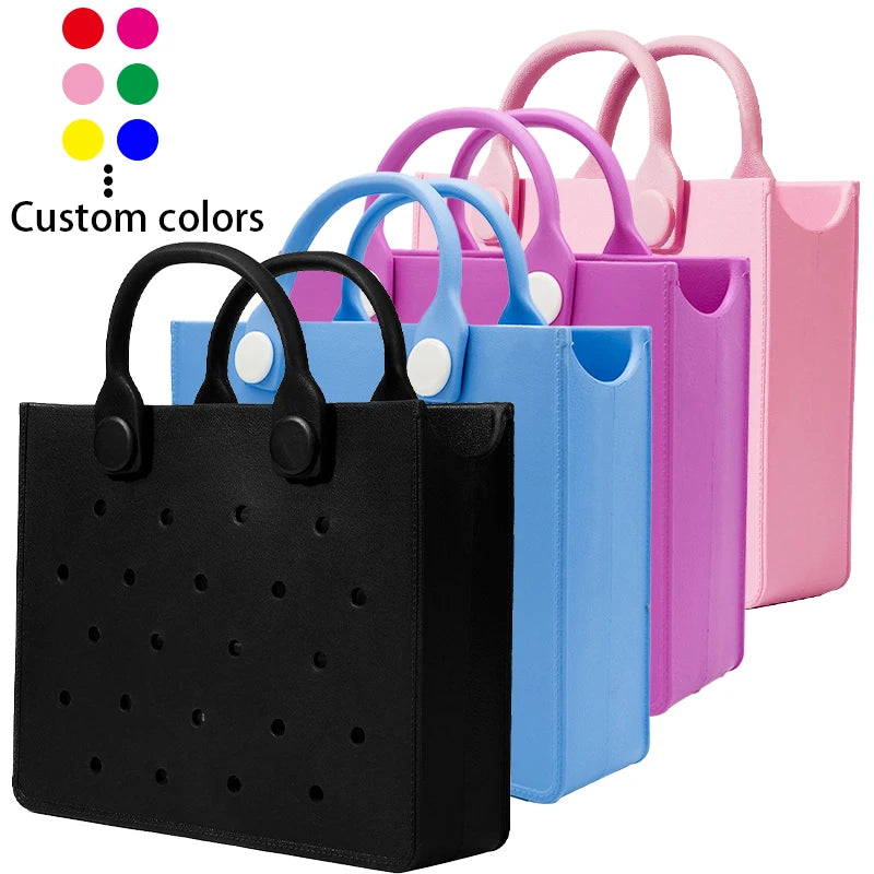 Waterproof EVA trunks and tote bags in black, blue, purple, and pink with charm holes for DIY customization.