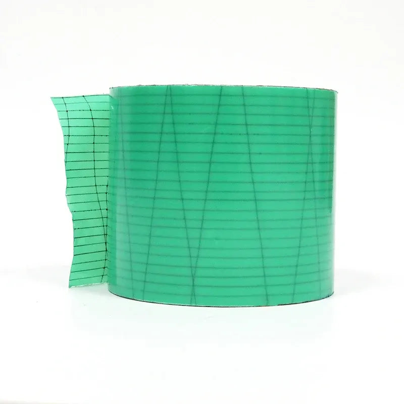 Green waterproof membrane tape roll with grid-printed surface and partially unwound strip