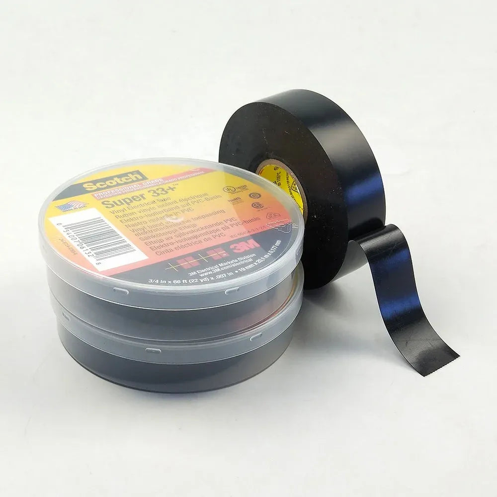 Black vinyl electrical tape roll with loose strip, label showing on spool