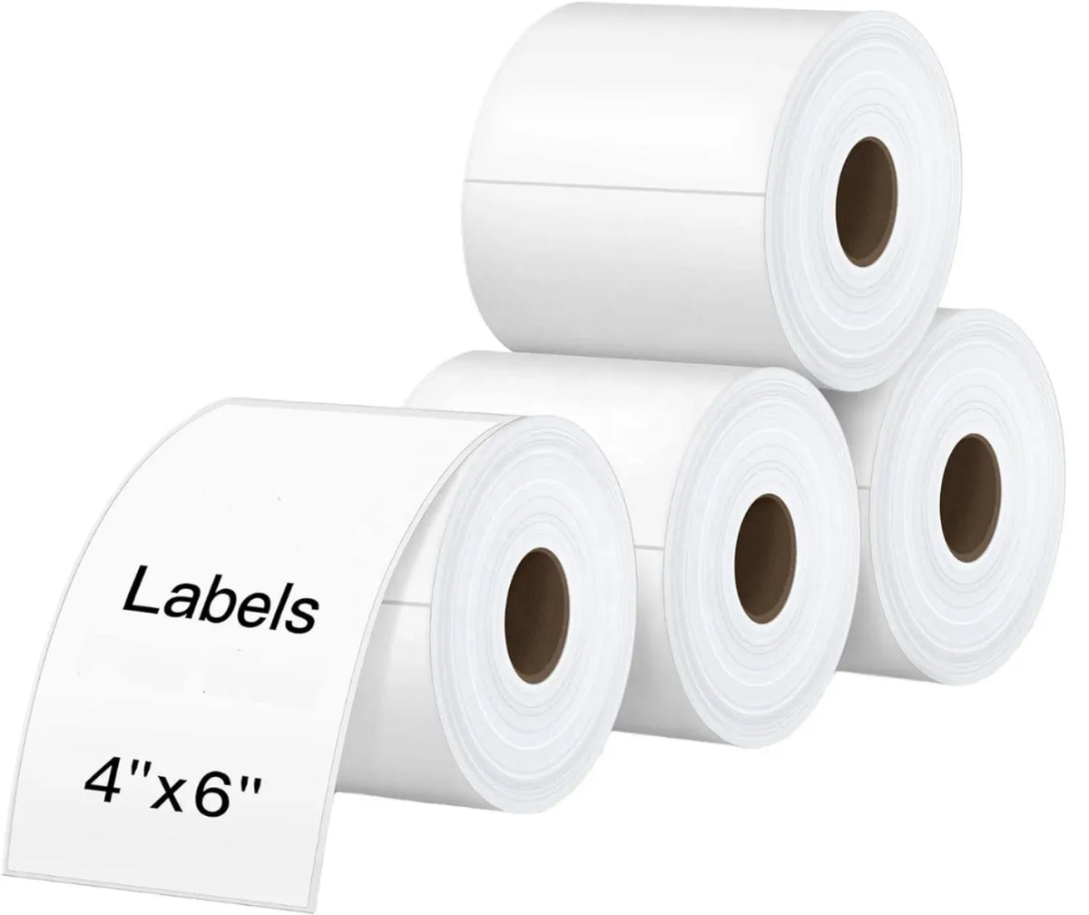 Stack of white glossy heat transfer label rolls, self-adhesive 4 x 6 in blank
