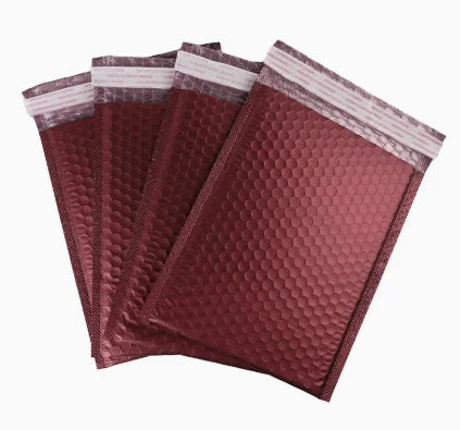 Burgundy red metallic bubble mailer bags with raised bubble texture