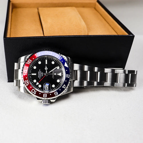 40mm stainless steel automatic mechanical watch with black dial, luminous markers, and red-blue Pepsi GMT bezel.