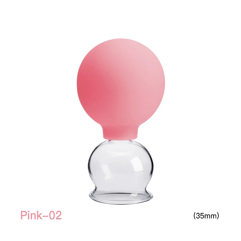 A 35mm pink silicone bulb attached to a transparent glass vacuum cupping jar for facial and body massage.