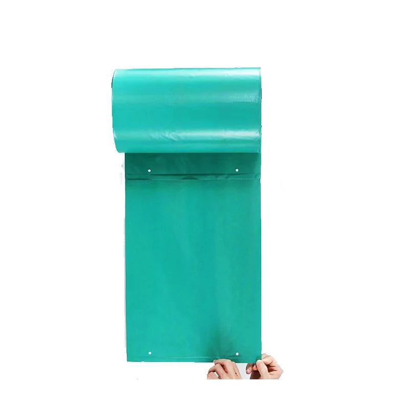 Green rolled plastic packaging bag with perforated edge for automated dispensing