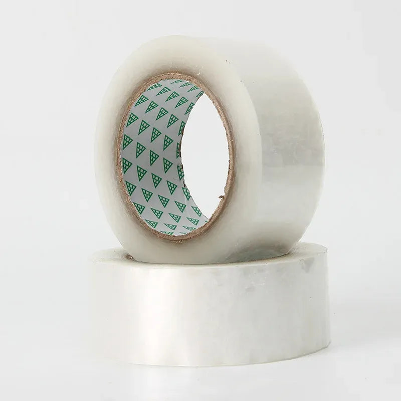Clear/white packing tape roll showing a green logo-pattern core through the center
