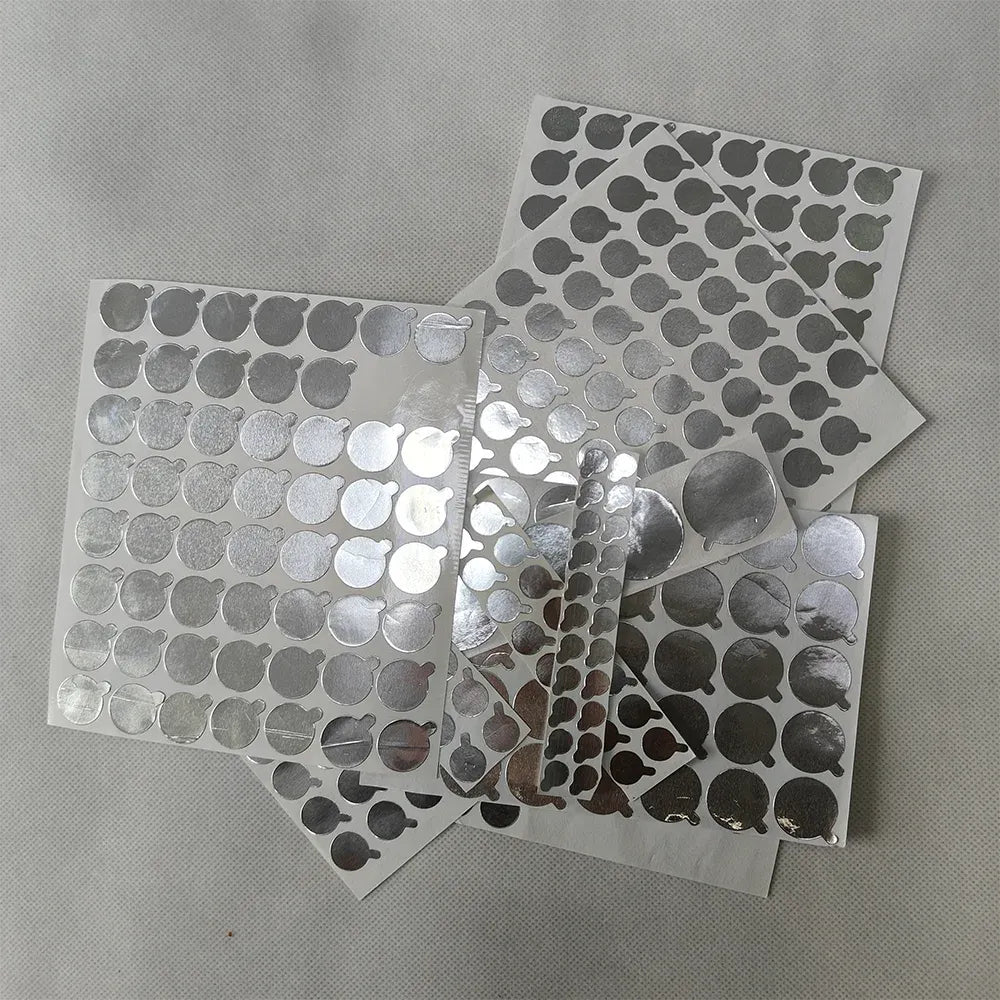 Aluminum seal sticker sheets with round metallic dots in varied shades