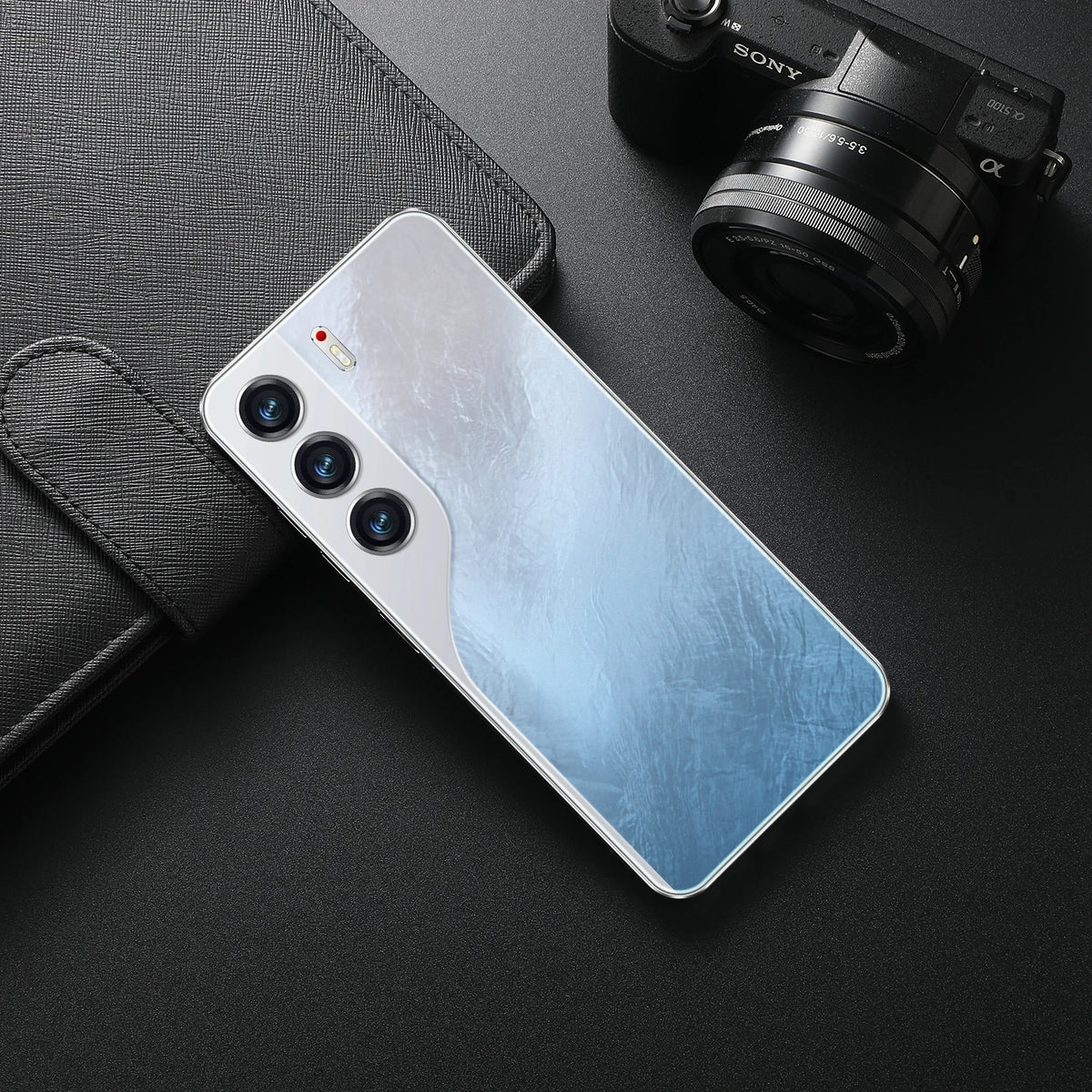 Light blue smartphone back with triple camera module on dark case