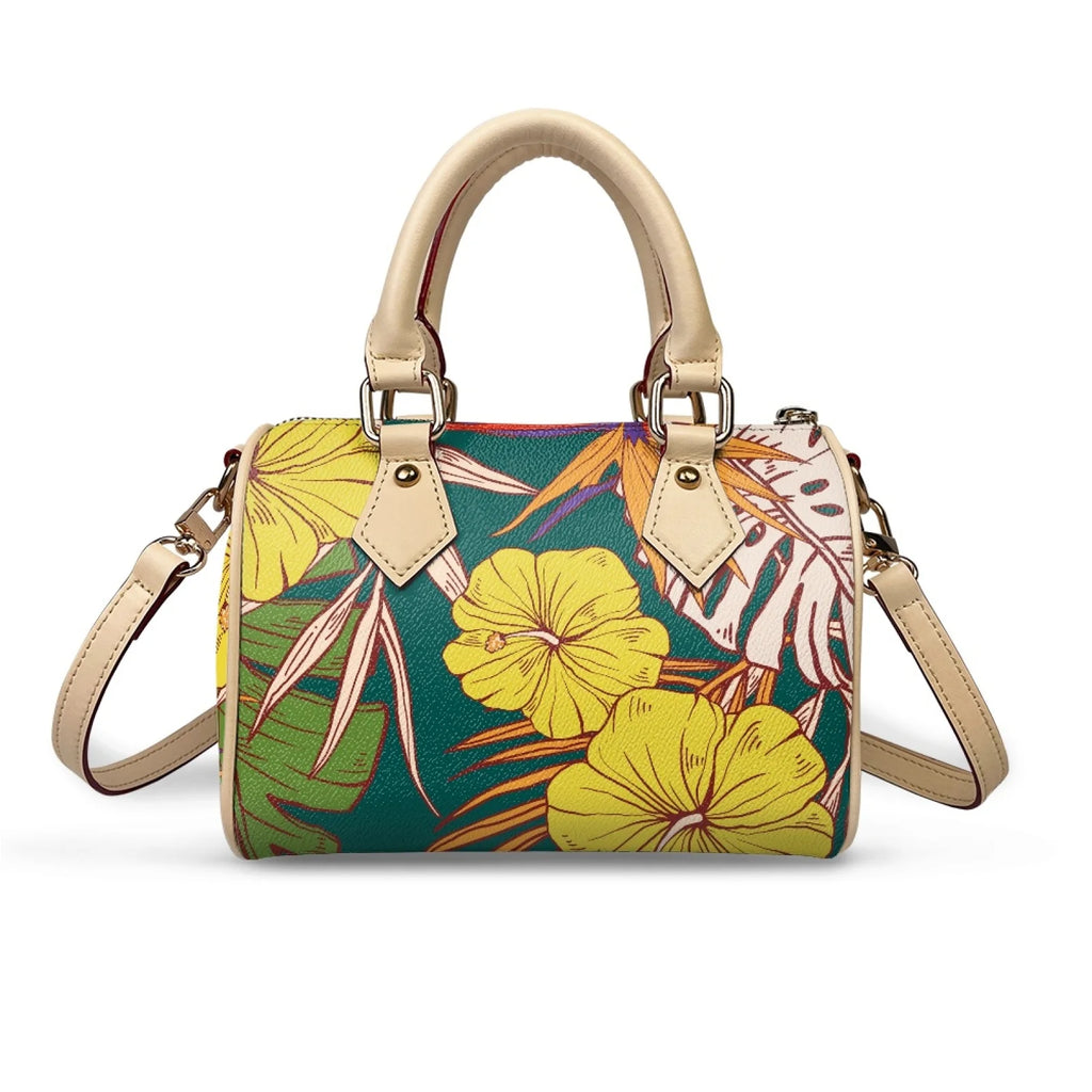 Waterproof PU trunk handbag with Samoan Polynesian floral print, yellow hibiscus, green leaves, and beige strap.