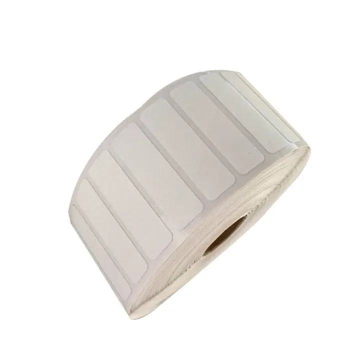 White adhesive iron-on name label tag roll with barcode-style stripe layout