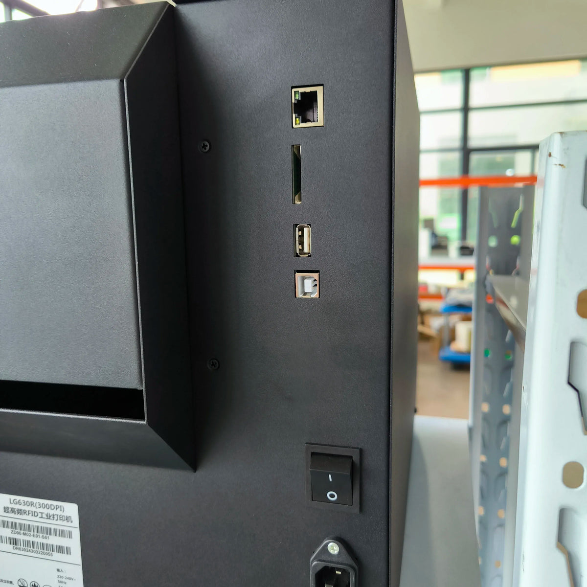 Black label printer back panel with network and USB ports and power switch